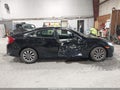 2016 Honda Civic — photo 13 of 16 | VIN 19XFC2F57GE013720