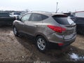 2011 Hyundai Tucson — photo 3 of 16 | VIN KM8JU3AC1BU252818