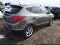 2011 Hyundai Tucson — photo 4 of 16 | VIN KM8JU3AC1BU252818