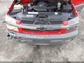 2002 Chevrolet Avalanche — photo 10 of 11 | VIN 3GNEC13TX2G300207