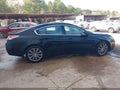 2014 Acura TL — photo 13 of 16 | VIN 19UUA8F39EA000645