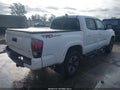 2017 Toyota Tacoma — photo 4 of 16 | VIN 3TMAZ5CN7HM049817