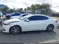 2016 Acura TLX — photo 14 of 16 | VIN 19UUB1F37GA007343