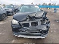 2015 BMW X1 — photo 12 of 16 | VIN WBAVM1C5XFVW58778