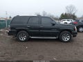 2002 Cadillac Escalade — photo 13 of 16 | VIN 1GYEK63N42R114912
