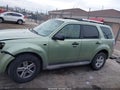 2009 Mercury Mariner — photo 14 of 16 | VIN 4M2CU87G39KJ00771