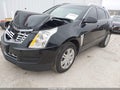 2016 Cadillac SRX — photo 2 of 17 | VIN 3GYFNBE3XGS508077