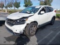 2018 Honda CR-V — photo 2 of 16 | VIN 2HKRW1H8XJH516733