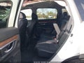 2018 Honda CR-V — photo 8 of 16 | VIN 2HKRW1H8XJH516733
