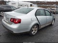 2009 Volkswagen Jetta — photo 4 of 16 | VIN 3VWHM71K59M075011