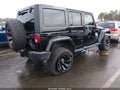2014 Jeep Wrangler Unlimited — photo 4 of 17 | VIN 1C4BJWEG3EL195919