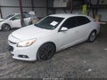 2014 Chevrolet Malibu — photo 2 of 11 | VIN 1G11E5SL3EF182820