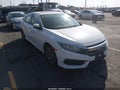 2016 Honda Civic — photo 1 of 17 | VIN 2HGFC2F77GH555729