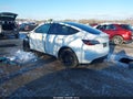2021 Tesla Model Y — photo 3 of 20 | VIN 5YJYGAEE6MF180357