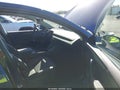 2026 Tesla Model Y — photo 5 of 17 | VIN 7SAYGDED0TF536764