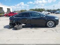 2019 Tesla Model X — photo 13 of 16 | VIN 5YJXCDE28KF152779
