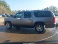 2011 Chevrolet Suburban 1500 — photo 14 of 16 | VIN 1GNSCJE09BR138348