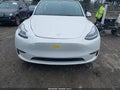 2022 Tesla Model Y — photo 23 of 24 | VIN 7SAYGAEE2NF570912