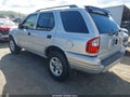 2001 Isuzu Rodeo — photo 3 of 11 | VIN 4S2DM58W514318447