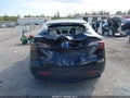 2025 Tesla Model Y — photo 6 of 16 | VIN 7SAYGDED8SF253561