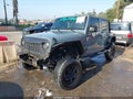 2014 Jeep Wrangler Unlimited — photo 2 of 20 | VIN 1C4BJWDG2EL305179