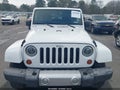 2013 Jeep Wrangler Unlimited — photo 12 of 16 | VIN 1C4BJWEGXDL550261
