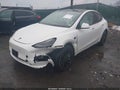 2023 Tesla Model Y — photo 2 of 20 | VIN 7SAYGDEF8PF914515