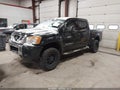 2012 Nissan Titan — photo 2 of 17 | VIN 1N6AA0EC2CN330697