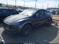 2026 Tesla Model Y — photo 14 of 18 | VIN 7SAYGDED5TF459762