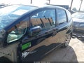 2013 Honda Fit — photo 15 of 17 | VIN JHMGE8H58DC076034
