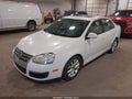 2010 Volkswagen Jetta — photo 2 of 12 | VIN 3VWRZ7AJ8AM149703