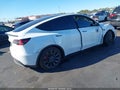 2023 Tesla Model Y — photo 4 of 16 | VIN 7SAYGDEF5PF837098