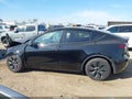 2025 Tesla Model Y — photo 14 of 18 | VIN 7SAYGDED5SF227130