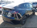 2025 Tesla Model Y — photo 4 of 18 | VIN 7SAYGDED5SF227130