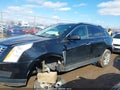 2016 Cadillac SRX — photo 15 of 17 | VIN 3GYFNBE39GS523671