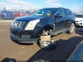 2016 Cadillac SRX — photo 2 of 17 | VIN 3GYFNBE39GS523671