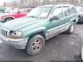 1999 Jeep Grand Cherokee — photo 2 of 11 | VIN 1J4GW58N2XC706979