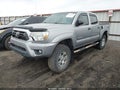2014 Toyota Tacoma — photo 2 of 19 | VIN 3TMLU4EN1EM146313
