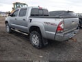 2014 Toyota Tacoma — photo 3 of 19 | VIN 3TMLU4EN1EM146313