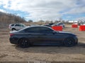 2021 BMW M550i xDrive — photo 13 of 16 | VIN WBA13BK04MCH49294