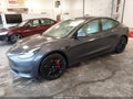 2022 Tesla Model 3 — photo 2 of 17 | VIN 5YJ3E1EC4NF103910