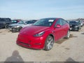 2023 Tesla Model Y — photo 2 of 16 | VIN 7SAYGDEE3PF707733