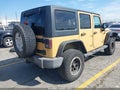 2014 Jeep Wrangler Unlimited — photo 4 of 17 | VIN 1C4BJWDG4EL148691