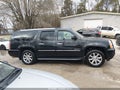 2011 GMC Yukon XL — photo 13 of 16 | VIN 1GKS2MEF2BR166269