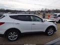 2013 Hyundai Santa Fe — photo 13 of 16 | VIN 5XYZUDLA6DG101535