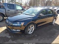 2013 Volkswagen Passat — photo 2 of 11 | VIN 1VWCM7A31DC012002