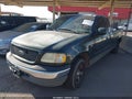2002 Ford F-150 — photo 2 of 13 | VIN 1FTRX17W72NB04347