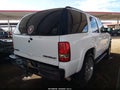 2002 Chevrolet Tahoe — photo 4 of 11 | VIN 1GNEC13Z42R258265
