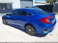 2017 Honda Civic — photo 3 of 16 | VIN 19XFC2F51HE044771