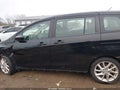 2012 Mazda 5 — photo 14 of 17 | VIN JM1CW2CL5C0141423